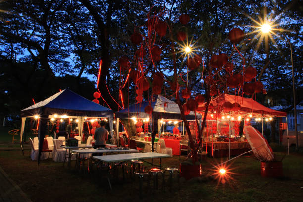tents and decorative lights at night
